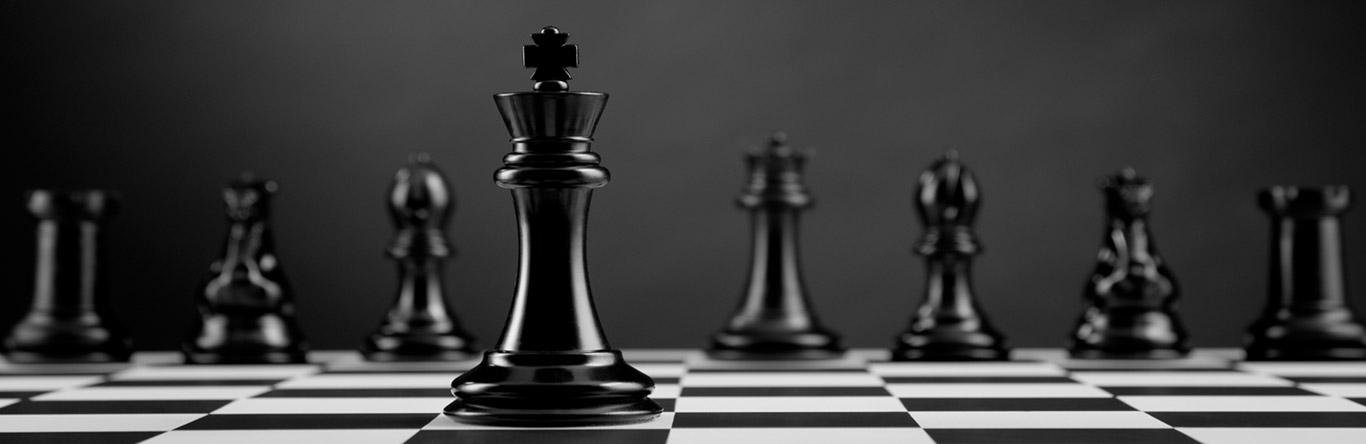 Leadership chess pieces on chess board
